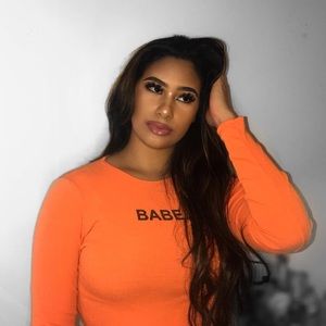Orange Bodysuit “Babe”